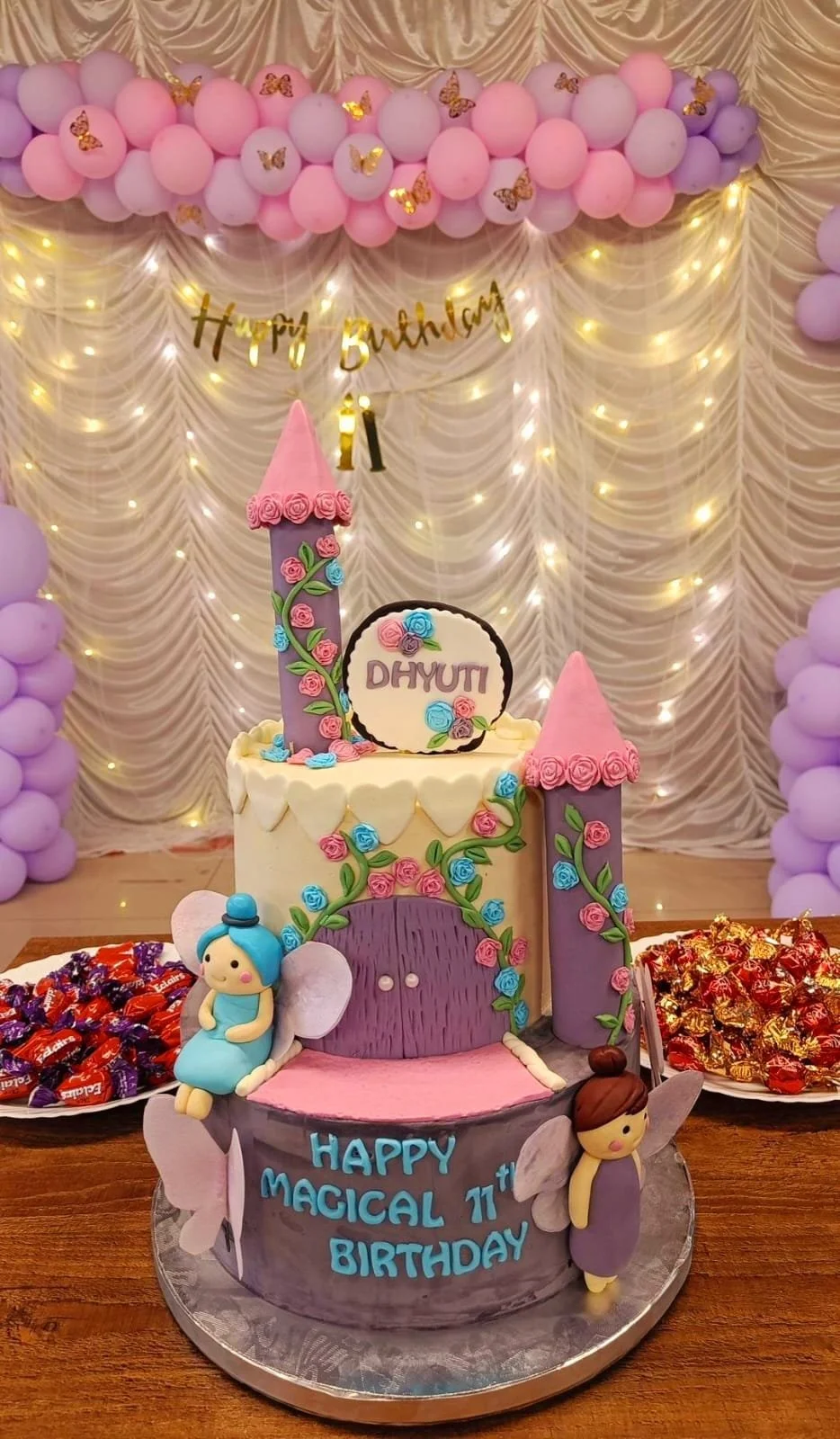 Handcrafted custom cake decorated with colorful frosting and edible toppers, made by Aaky's Bakery.
